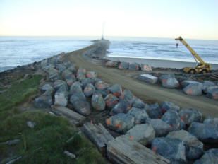 Road created onto of the No. Jetty to haul the new capping rock