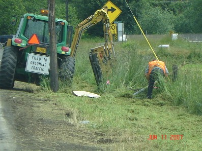 This is a photograph of roadside mowing which is a part of the Vegetation Management Program.